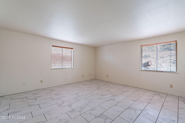 3531 W Goret Rd, Tucson, AZ 85745 - unfurnished room featuring light marble finish floors