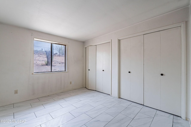 3531 W Goret Rd, Tucson, AZ 85745 - unfurnished bedroom with two closets