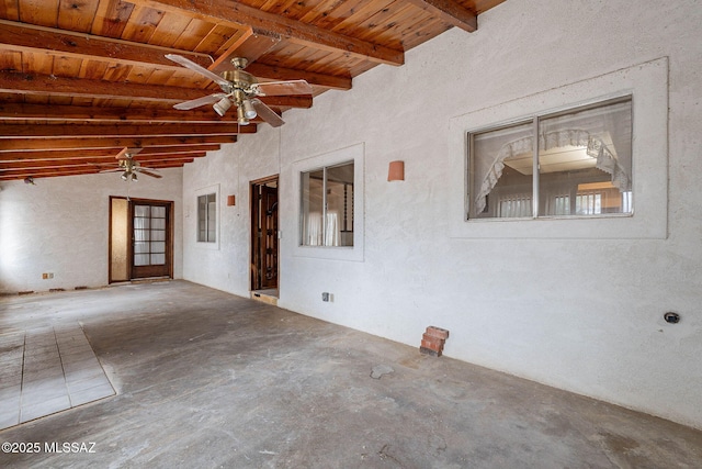 3531 W Goret Rd, Tucson, AZ 85745 - unfurnished room with unfinished concrete floors, wood ceiling, a ceiling fan, and beamed ceiling