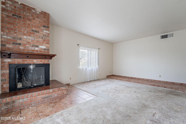 3531 W Goret Rd, Tucson, AZ 85745 - unfurnished living room featuring carpet, a fireplace, and tile patterned floors