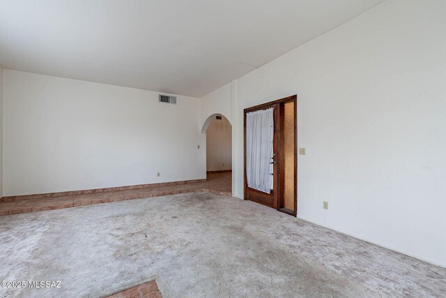 3531 W Goret Rd, Tucson, AZ 85745 - unfurnished room with arched walkways and carpet floors