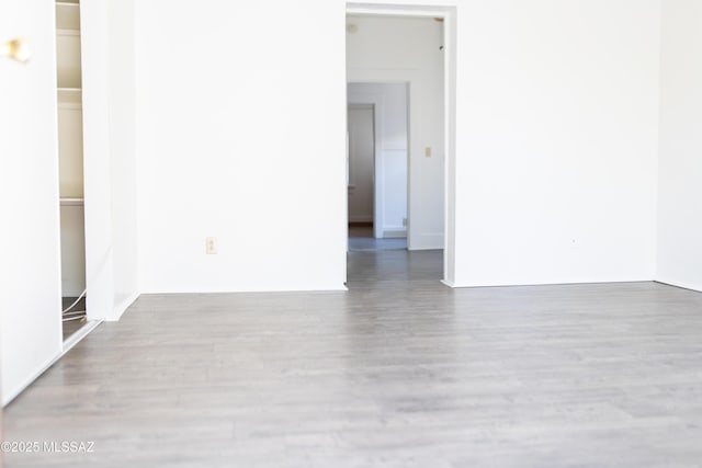 616 E 8th St, Tucson, AZ 85705 - empty room featuring wood finished floors