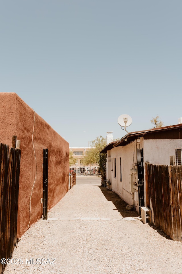 616 E 8th St, Tucson, AZ 85705 - view of home's exterior with fence