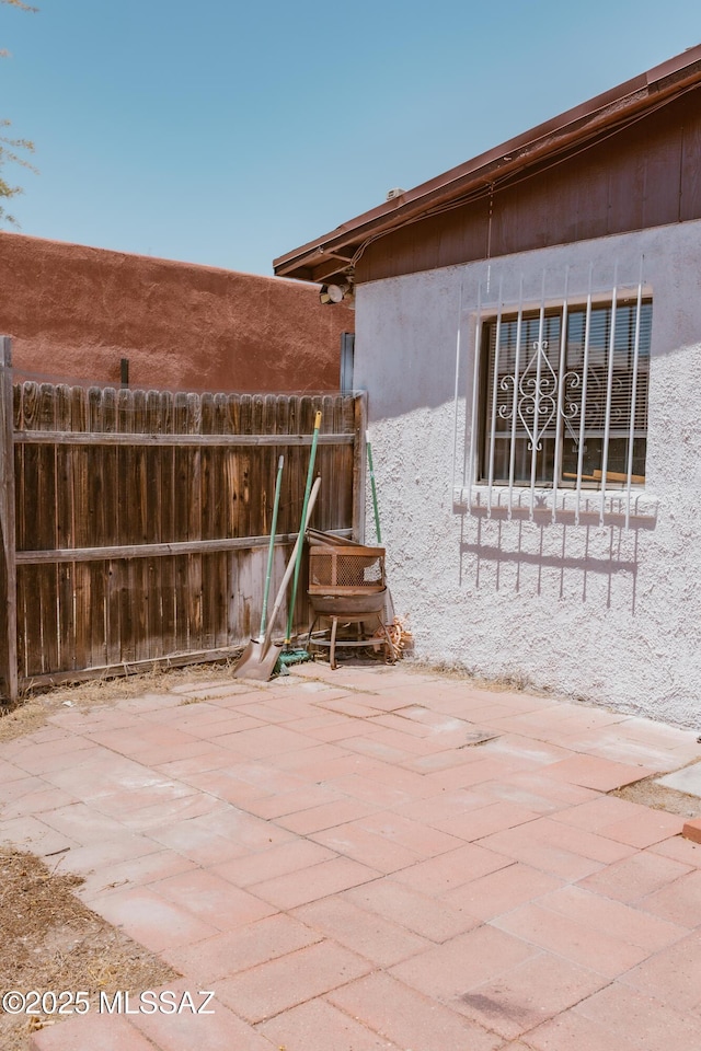 616 E 8th St, Tucson, AZ 85705 - view of patio / terrace featuring fence