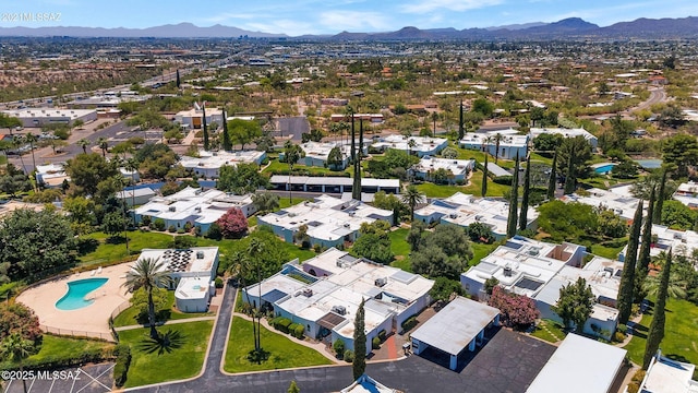708 W Roller Coaster Rd, Tucson, AZ 85704 - drone / aerial view of a mountainous background and a pool