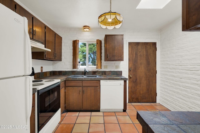 708 W Roller Coaster Rd, Tucson, AZ 85704 - kitchen featuring white appliances, a sink, under cabinet range hood, light tile patterned flooring, and decorative light fixtures