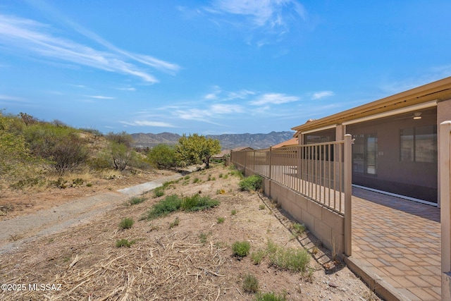 63370 E Whispering Tree Ln, Saddlebrooke, AZ 85739 - view of yard featuring a mountain view and fence