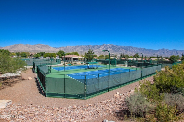 36359 S Wind Crest Dr, Saddlebrooke, AZ 85739 - view of tennis court with fence and a mountain view