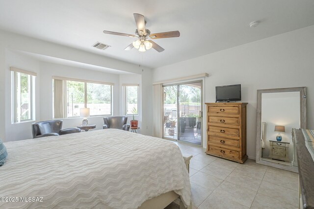 825 E Gunsight Mountain Pl, Sahuarita, AZ 85629 - bedroom with access to exterior, multiple windows, light tile patterned floors, and a ceiling fan