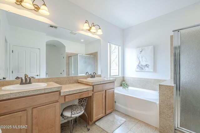 825 E Gunsight Mountain Pl, Sahuarita, AZ 85629 - bathroom featuring a stall shower, a bath, double vanity, and tile patterned flooring