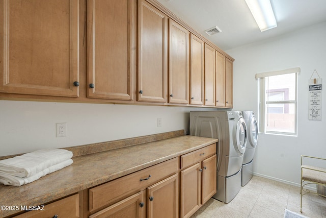 825 E Gunsight Mountain Pl, Sahuarita, AZ 85629 - laundry room featuring washer and dryer, cabinet space, baseboards, and light tile patterned floors