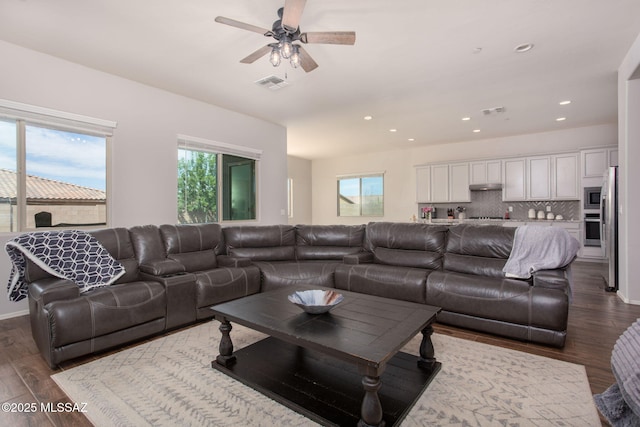12493 N Blondin Dr, Marana, AZ 85653 - living area with dark wood-type flooring, ceiling fan, and recessed lighting
