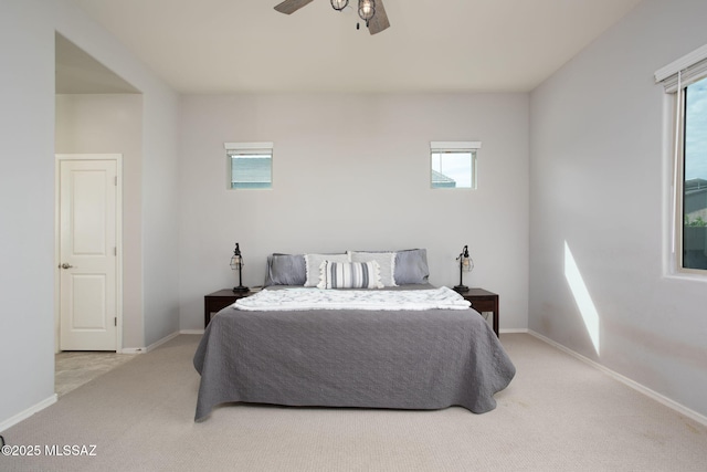 12493 N Blondin Dr, Marana, AZ 85653 - carpeted bedroom featuring baseboards and a ceiling fan
