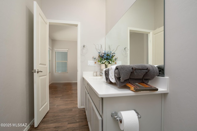 12493 N Blondin Dr, Marana, AZ 85653 - bathroom featuring wood finished floors, vanity, and baseboards