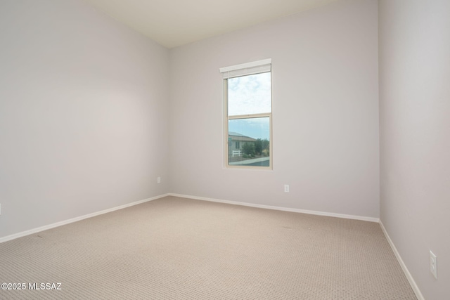12493 N Blondin Dr, Marana, AZ 85653 - spare room featuring carpet and baseboards