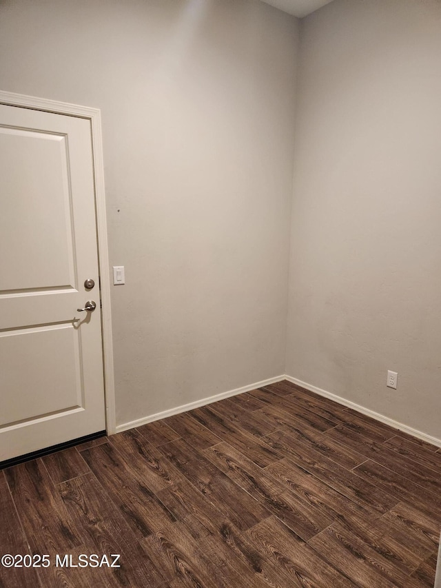 12493 N Blondin Dr, Marana, AZ 85653 - unfurnished room featuring dark wood finished floors and baseboards