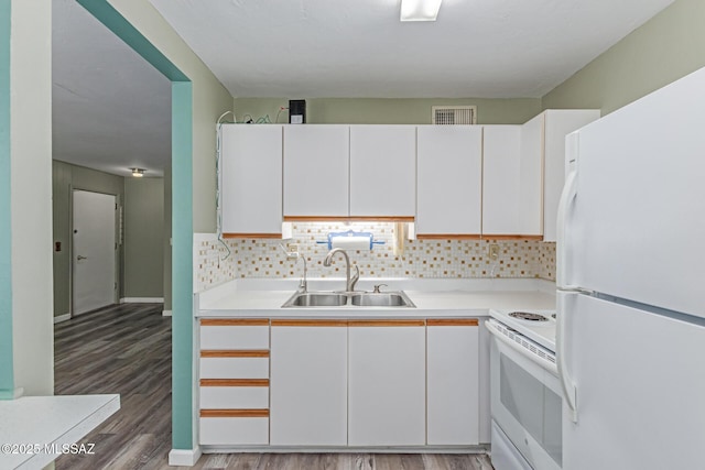 8150 E Broadway Blvd Unit H-107, Tucson, AZ 85710 - kitchen with white appliances, a sink, light wood-style flooring, and light countertops