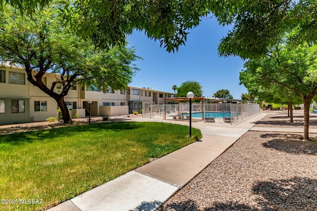 8150 E Broadway Blvd Unit H-107, Tucson, AZ 85710 - view of home's community with a pool