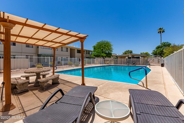 8150 E Broadway Blvd Unit H-107, Tucson, AZ 85710 - community pool with a pergola and a patio area