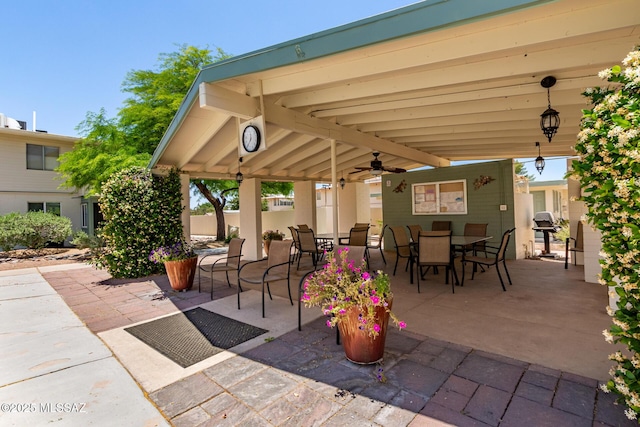 8150 E Broadway Blvd Unit H-107, Tucson, AZ 85710 - view of patio / terrace with outdoor dining area and a ceiling fan