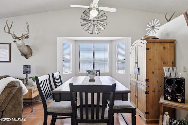 1861 W Sauvignon Dr, Tucson, AZ 85746 - dining area featuring vaulted ceiling, a ceiling fan, and light tile patterned floors