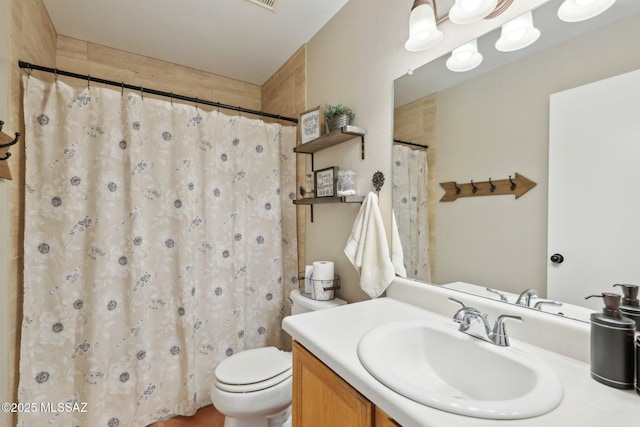 1861 W Sauvignon Dr, Tucson, AZ 85746 - bathroom featuring toilet, vanity, and a shower with curtain