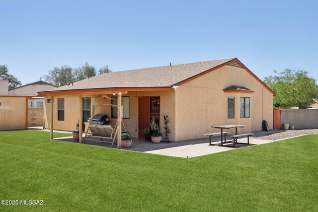 1861 W Sauvignon Dr, Tucson, AZ 85746 - rear view of property with a patio, a ceiling fan, a shingled roof, and stucco siding