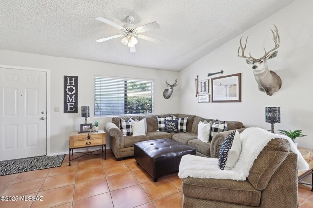 1861 W Sauvignon Dr, Tucson, AZ 85746 - living room featuring a textured ceiling, light tile patterned floors, and a ceiling fan