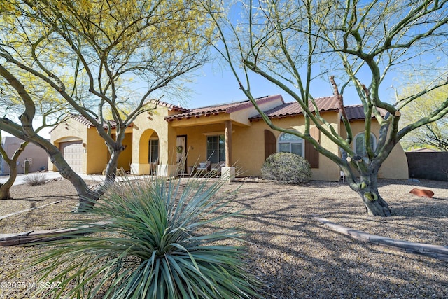 9451 S Via Bandera, Vail, AZ 85641 - mediterranean / spanish-style house with stucco siding, a tiled roof, and fence