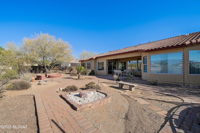 9451 S Via Bandera, Vail, AZ 85641 - rear view of property with a tile roof, a patio, and stucco siding