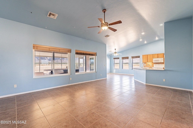 1176 W Trigger Ln, Cochise, AZ 85606 - unfurnished living room featuring a ceiling fan, tile patterned flooring, lofted ceiling, a sink, and baseboards