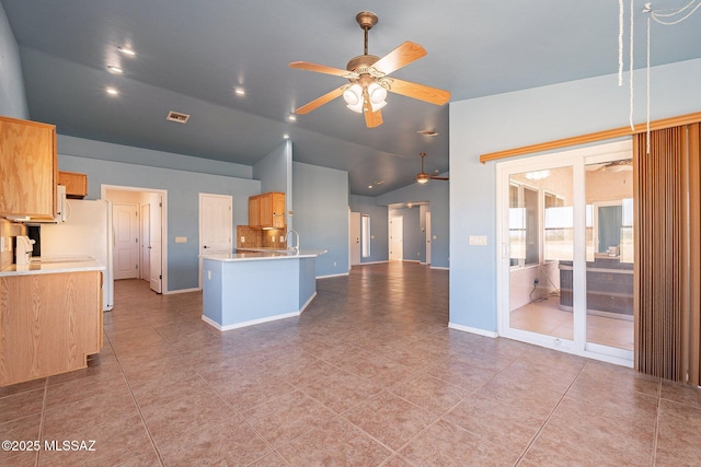 1176 W Trigger Ln, Cochise, AZ 85606 - kitchen featuring a ceiling fan, a sink, light countertops, light tile patterned flooring, and high vaulted ceiling