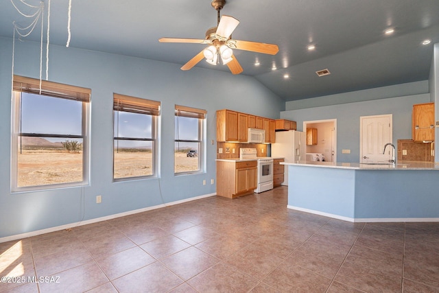 1176 W Trigger Ln, Cochise, AZ 85606 - kitchen featuring white appliances, light countertops, tile patterned flooring, a peninsula, and ceiling fan