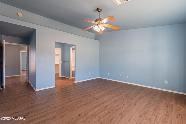 1176 W Trigger Ln, Cochise, AZ 85606 - unfurnished room with a ceiling fan, dark wood-type flooring, and baseboards