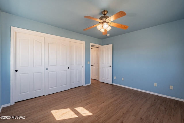 1176 W Trigger Ln, Cochise, AZ 85606 - unfurnished bedroom with baseboards, wood finished floors, and ceiling fan