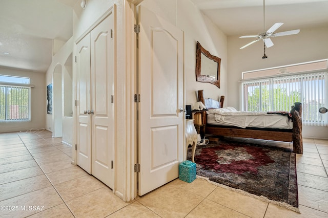 1797 W Naranja Dr, Oro Valley, AZ 85737 - bedroom with multiple windows, light tile patterned flooring, and ceiling fan