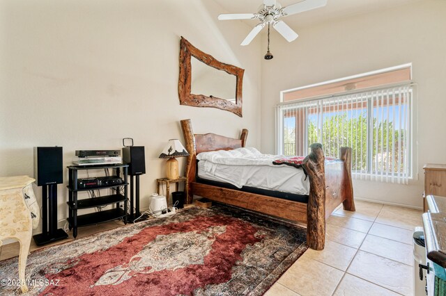 1797 W Naranja Dr, Oro Valley, AZ 85737 - bedroom featuring light tile patterned floors, high vaulted ceiling, and a ceiling fan