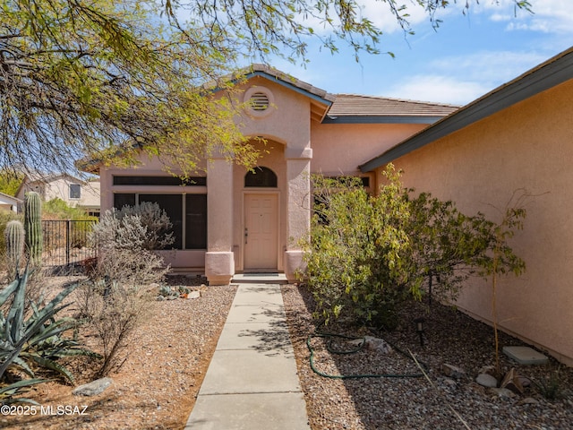 1797 W Naranja Dr, Oro Valley, AZ 85737 - property entrance with stucco siding and fence