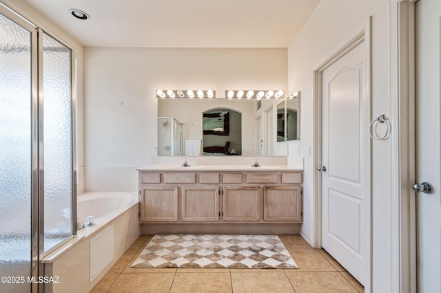 1797 W Naranja Dr, Oro Valley, AZ 85737 - full bath with a shower stall, double vanity, a garden tub, and tile patterned floors