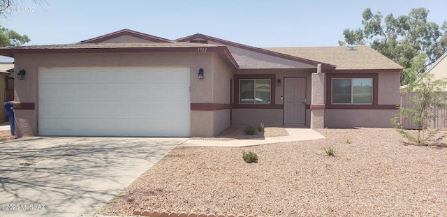 1732 W Pineriver Pl, Tucson, AZ 85746 - ranch-style home featuring concrete driveway, stucco siding, and an attached garage