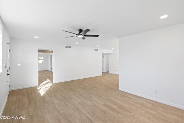5011 E Scarlett St, Tucson, AZ 85711 - unfurnished living room with recessed lighting, a ceiling fan, light wood-type flooring, and baseboards