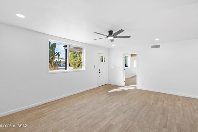 5011 E Scarlett St, Tucson, AZ 85711 - unfurnished living room featuring recessed lighting, ceiling fan, light wood-style flooring, and baseboards