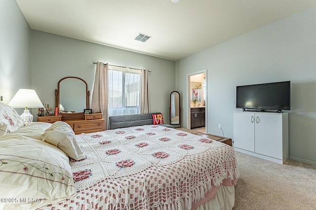 12625 N Wildrose Dr, Marana, AZ 85653 - bedroom with light carpet and connected bathroom