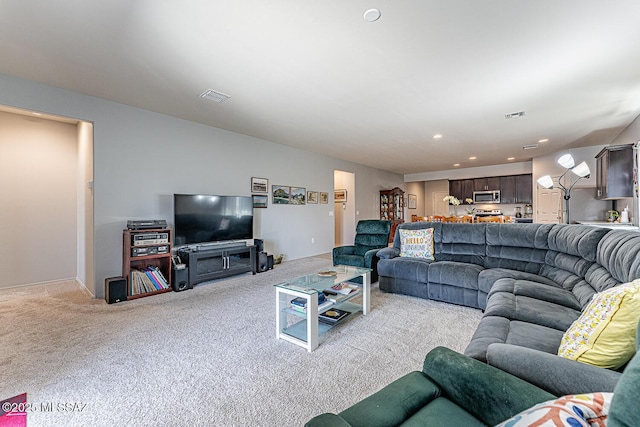 12625 N Wildrose Dr, Marana, AZ 85653 - living room featuring light colored carpet and recessed lighting