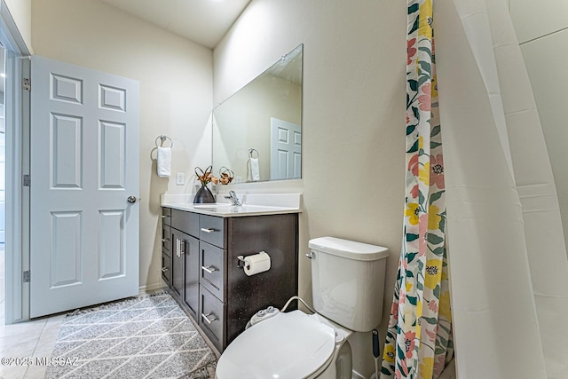 12625 N Wildrose Dr, Marana, AZ 85653 - bathroom featuring toilet, vanity, tile patterned floors, and curtained shower