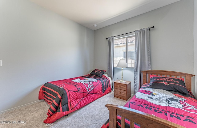 12625 N Wildrose Dr, Marana, AZ 85653 - bedroom with carpet floors and baseboards