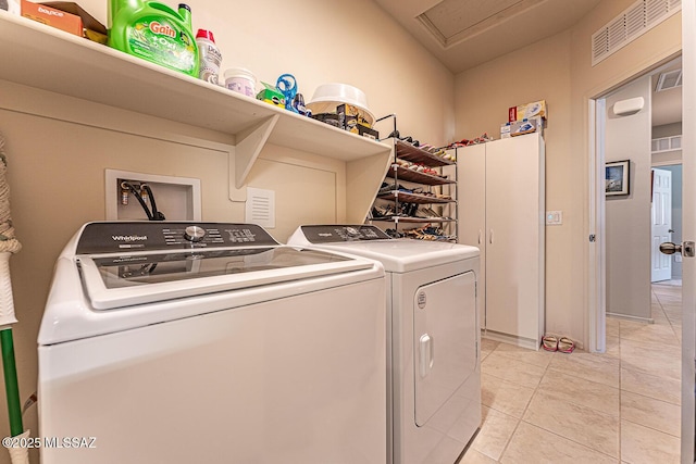 12625 N Wildrose Dr, Marana, AZ 85653 - clothes washing area featuring washing machine and clothes dryer and light tile patterned floors