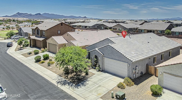 12625 N Wildrose Dr, Marana, AZ 85653 - aerial view of residential area with a mountainous background