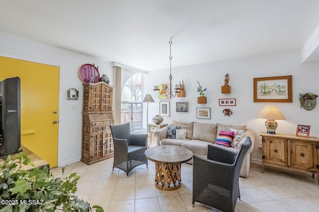 344 S Paseo Sarta Unit C, Green Valley, AZ 85614 - living room featuring light tile patterned floors and a chandelier
