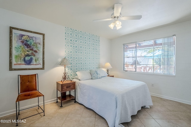 344 S Paseo Sarta Unit C, Green Valley, AZ 85614 - bedroom featuring light tile patterned flooring, baseboards, and a ceiling fan
